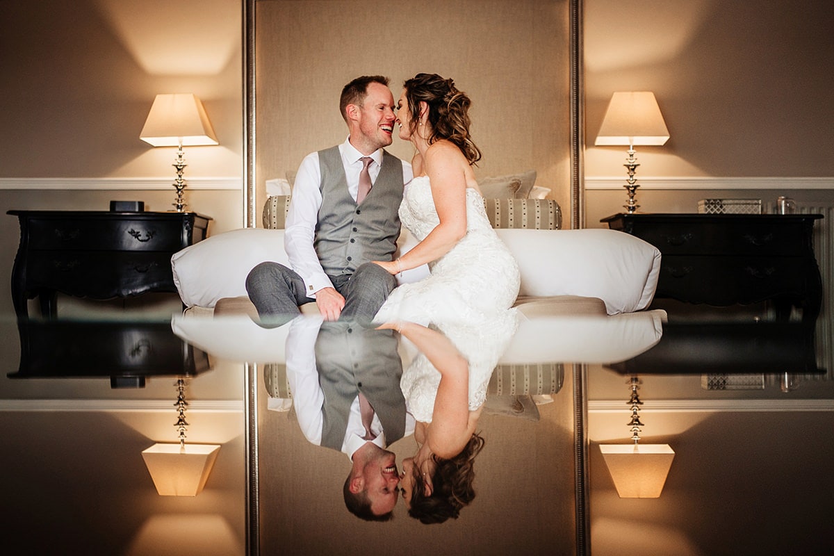 Bride and groom in the honeymoon suite at Farnham Castle